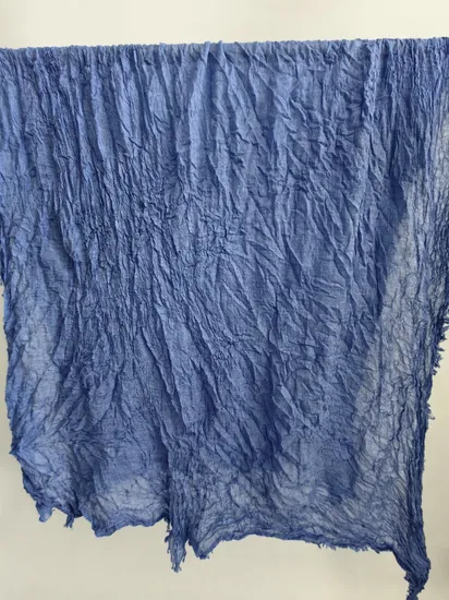 Pleated modal & cashmere wrap — supplier product photograph